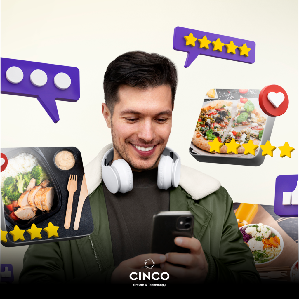 Um rapaz olhando a tela do celular com ícones flutuantes ao redor
